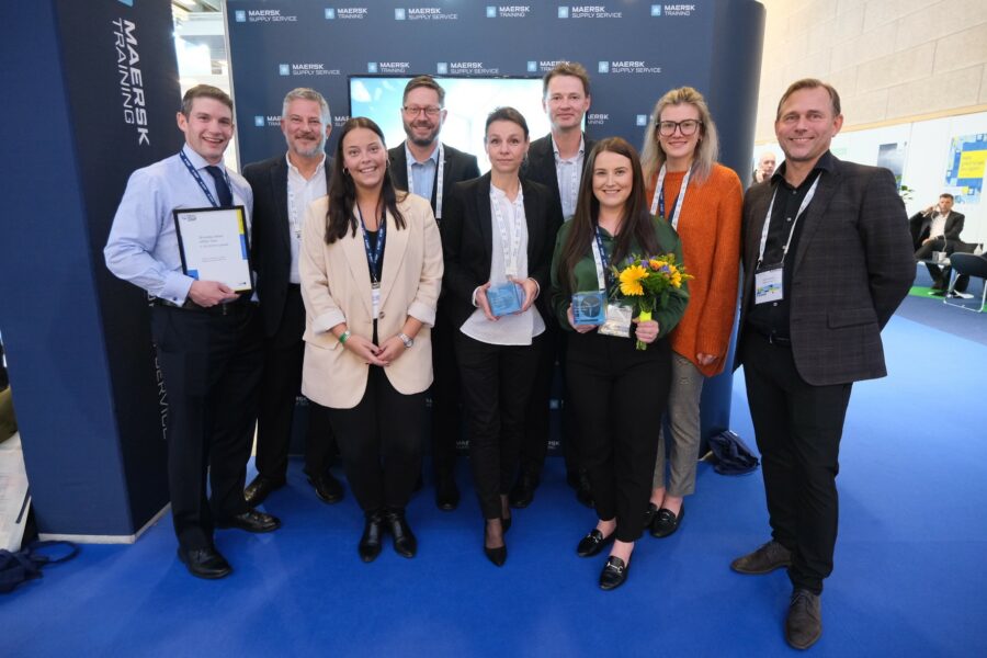 Maersk Training team on their stand at WindEurope Electric City - GWO award